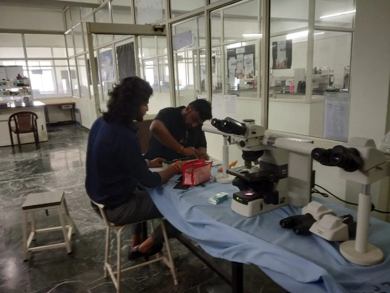 Microscope servicing in a laboratory
